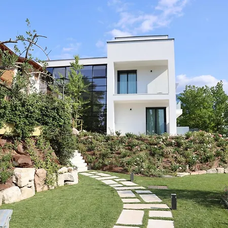 Aparthotel Midum Luxuryapartments Con Giardino 4*