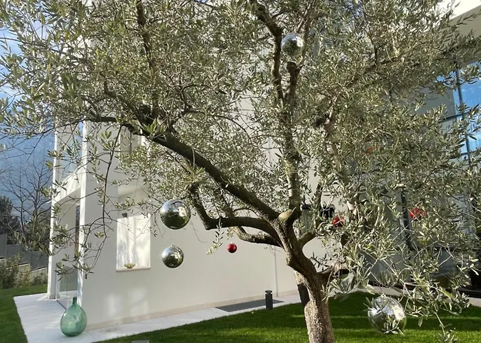 Aparthotel Midum Luxuryapartments Con Giardino Trient